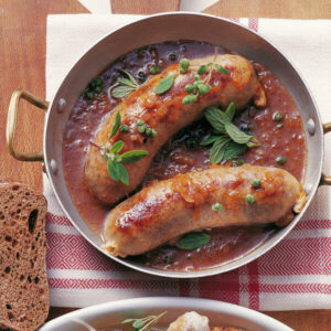 Würstchen und Kartoffelbrei mit Zwiebelsoße